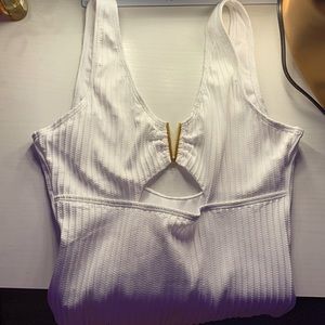 White one piece. Never been worn. Size: small